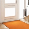 Ajtószőnyeg narancs és fekete 120 x 250 cm poliamid és pvc
