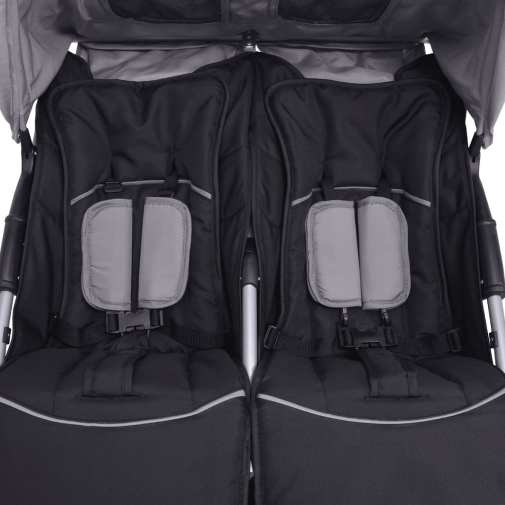 Szürke és fekete acél ikerbabakocsi